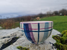 Load image into Gallery viewer, A small bowl on a stone with moss and lichen on it. Grass and hedge in the background