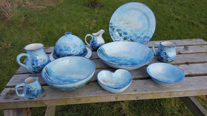 Sea blue pottery hand painted with individual designs capturing the turquoise blue seas of Islay 