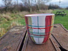 Load image into Gallery viewer, A mug on a bench with trees in the distance
